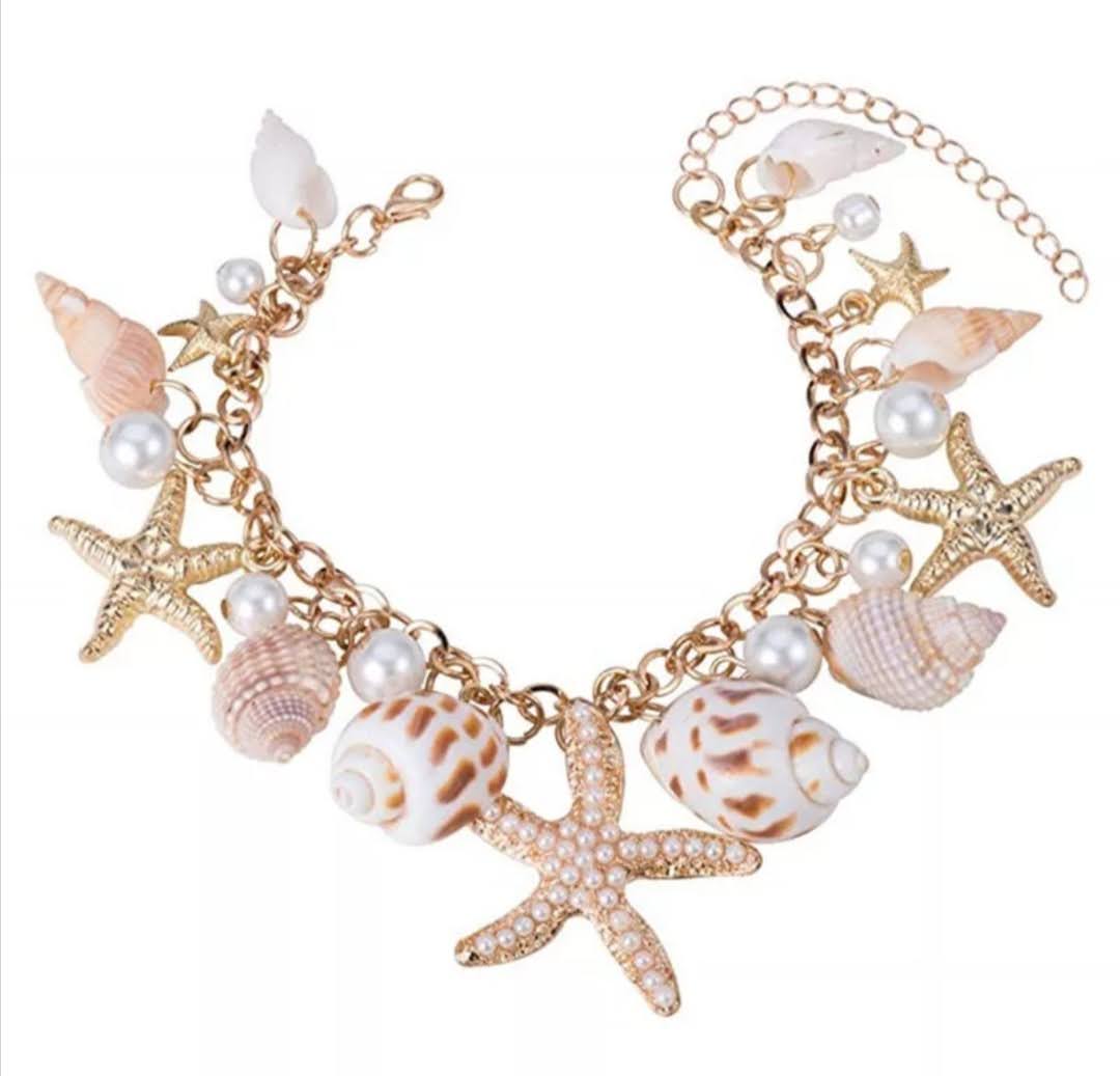 Krásný dámský náramek s mušličkami a perličkami