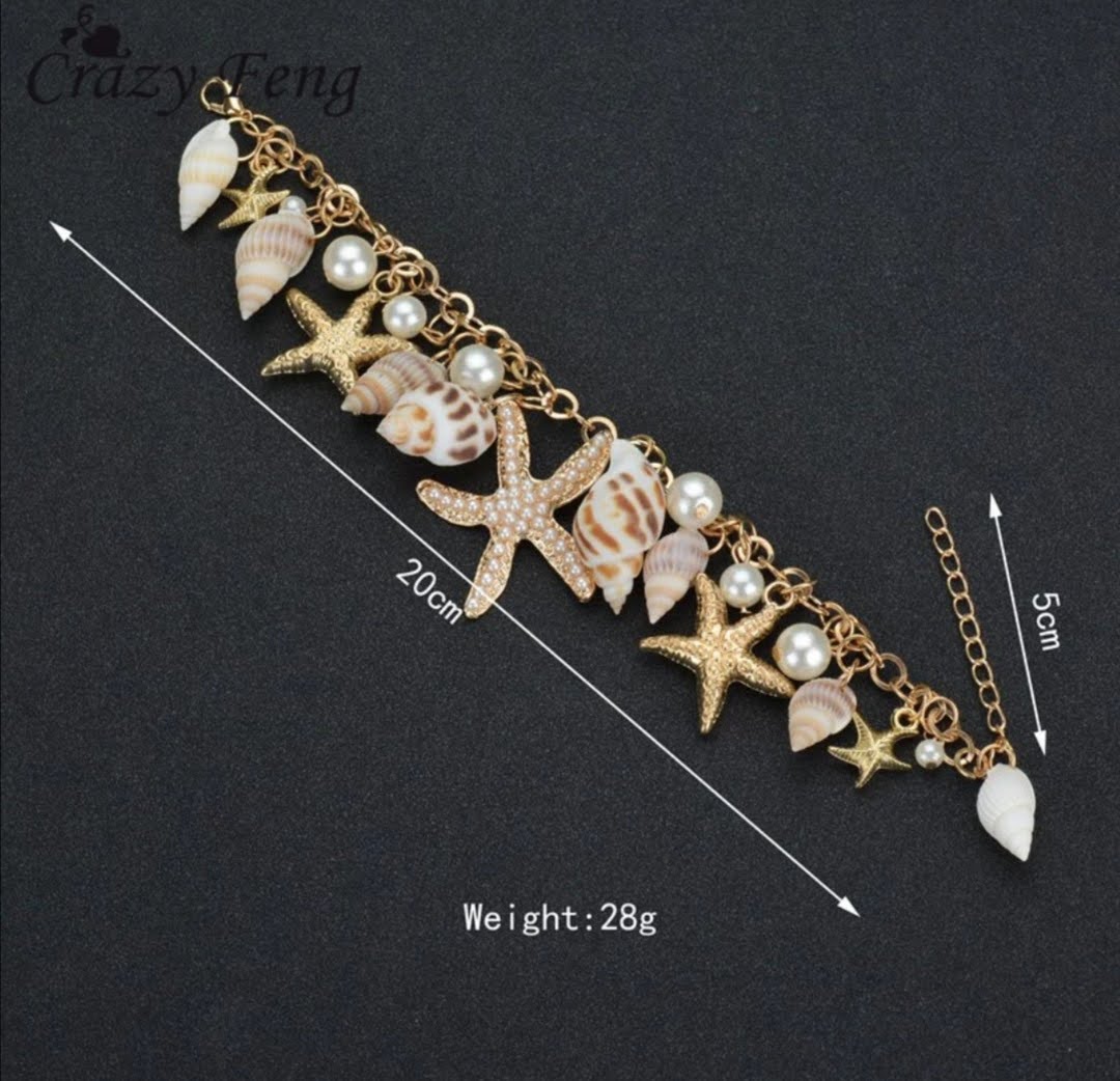 Krásný dámský náramek s mušličkami a perličkami