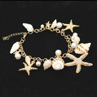 Krásný dámský náramek s mušličkami a perličkami